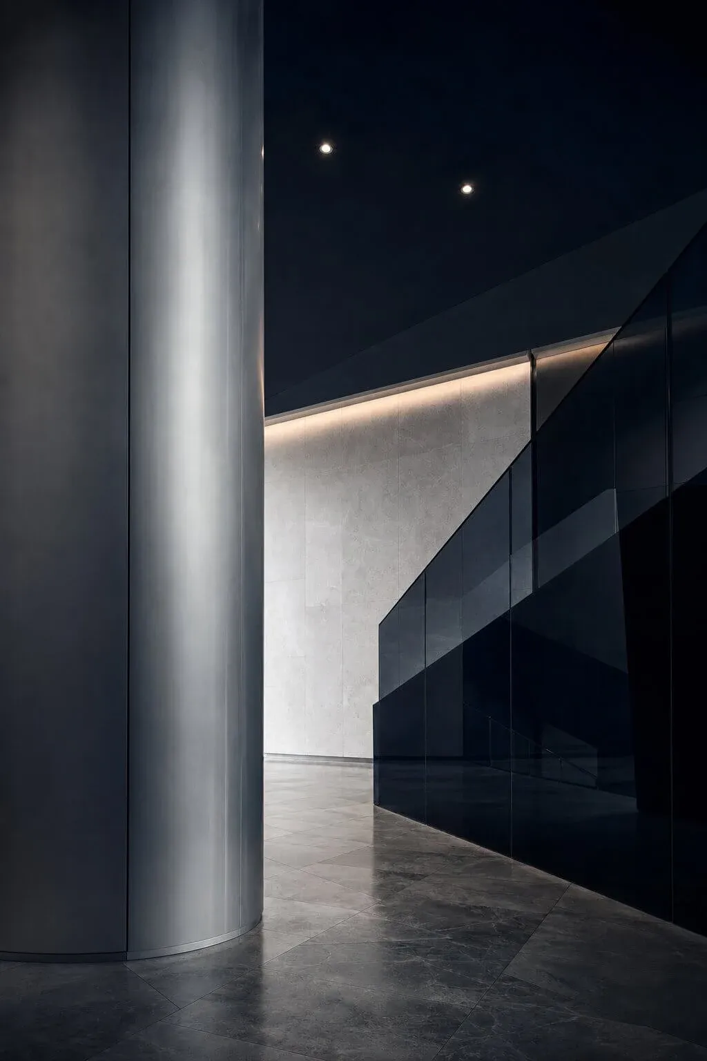 Sculptural architectural interior in navy and silver
